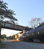 UP Western Pacific heritage unit going underneath SB CSX intermodal train